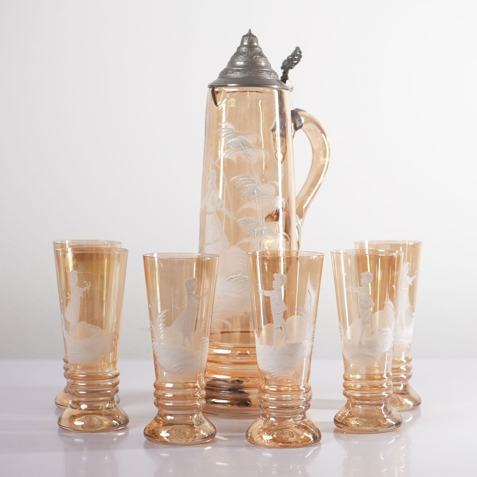 Mary Gregory Amber Glass Set with Pewter Lid Pitcher Central Europe, Circa 1880